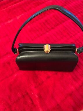 Sleek Black Leather purse with Gold-Tone Clasp